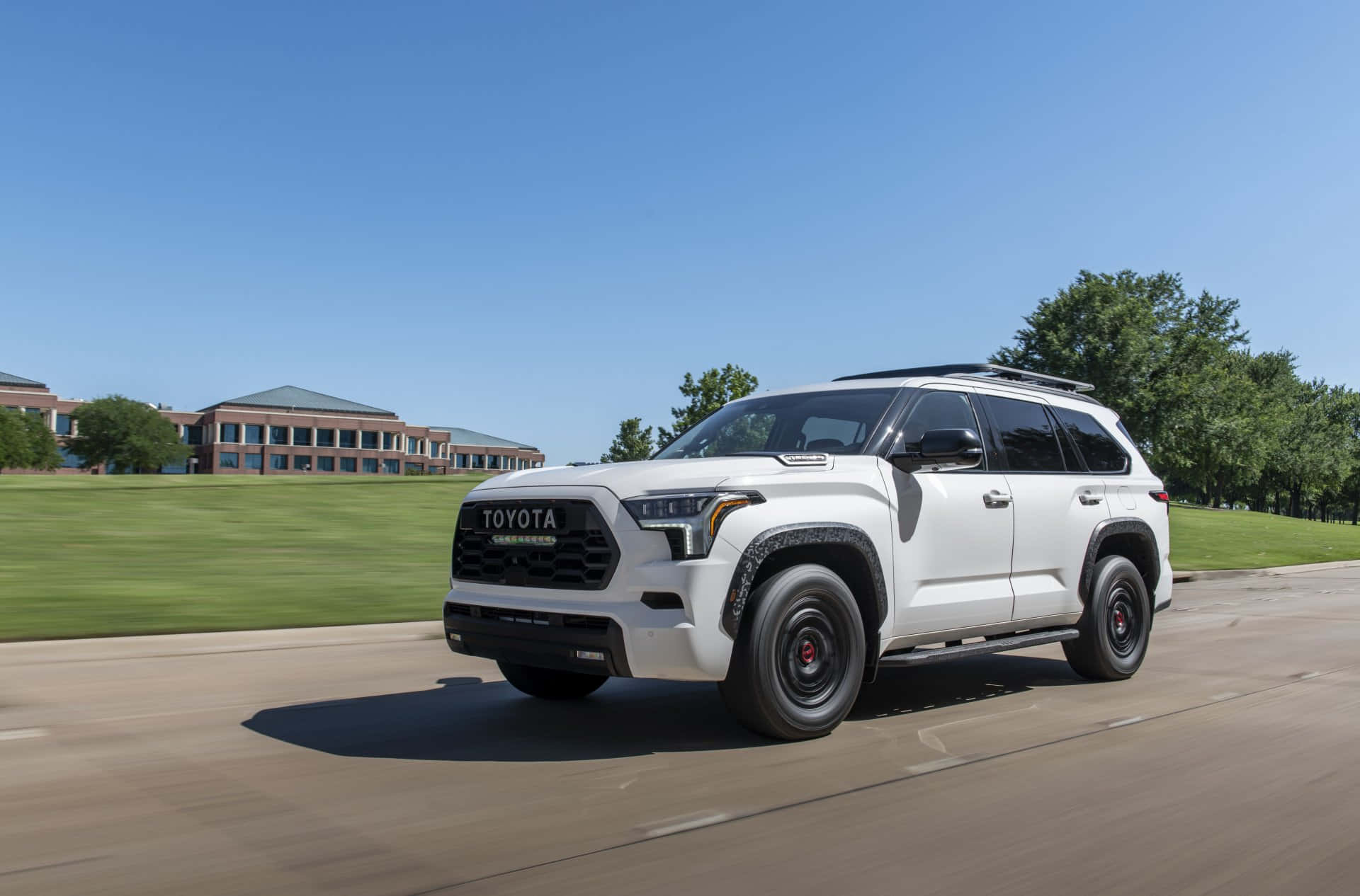 Caption: Captivating Toyota Sequoia On An Engaging Adventure Wallpaper