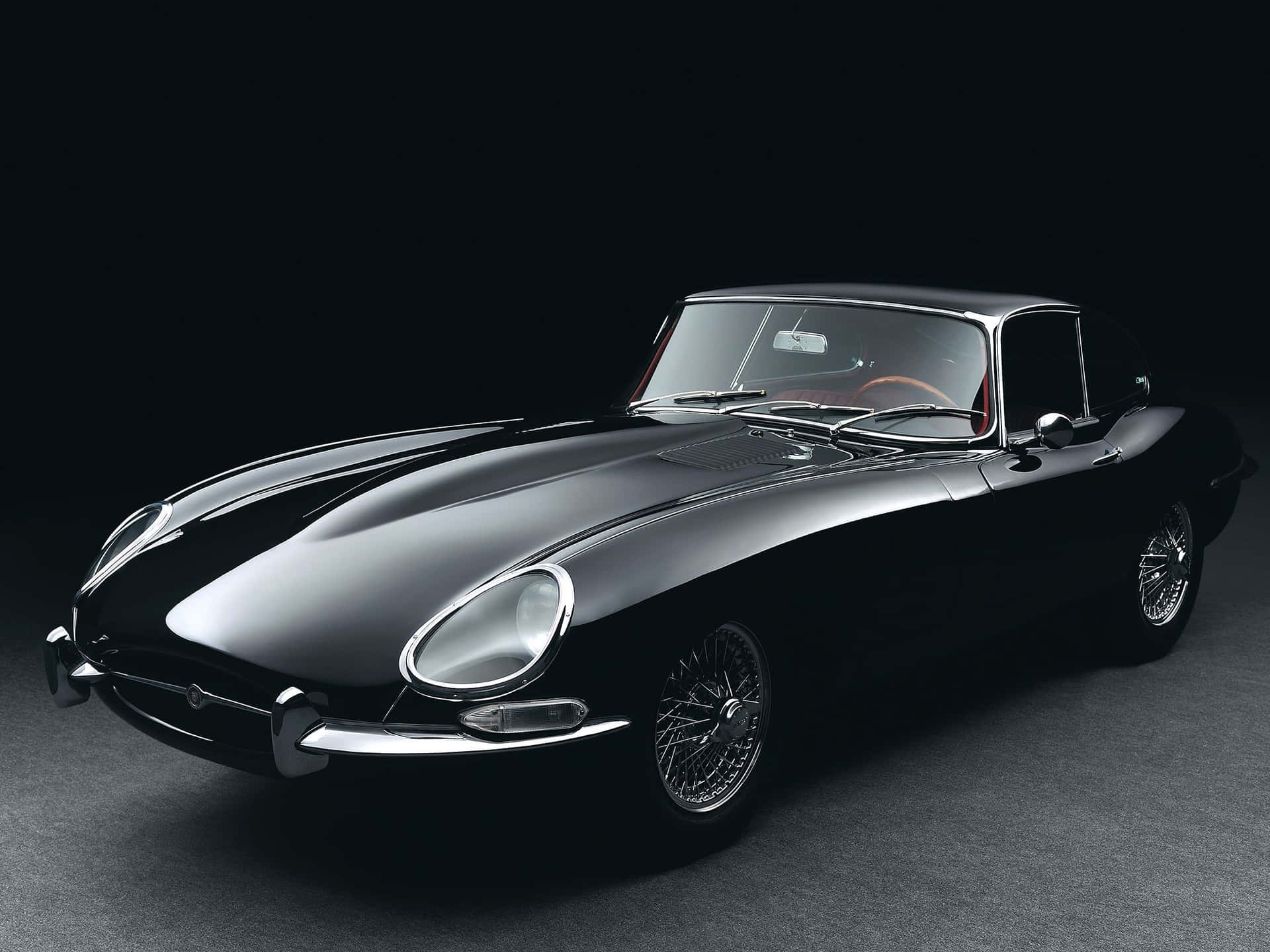 Caption: Classic Beauty Unleashed - The Jaguar E-type Wallpaper