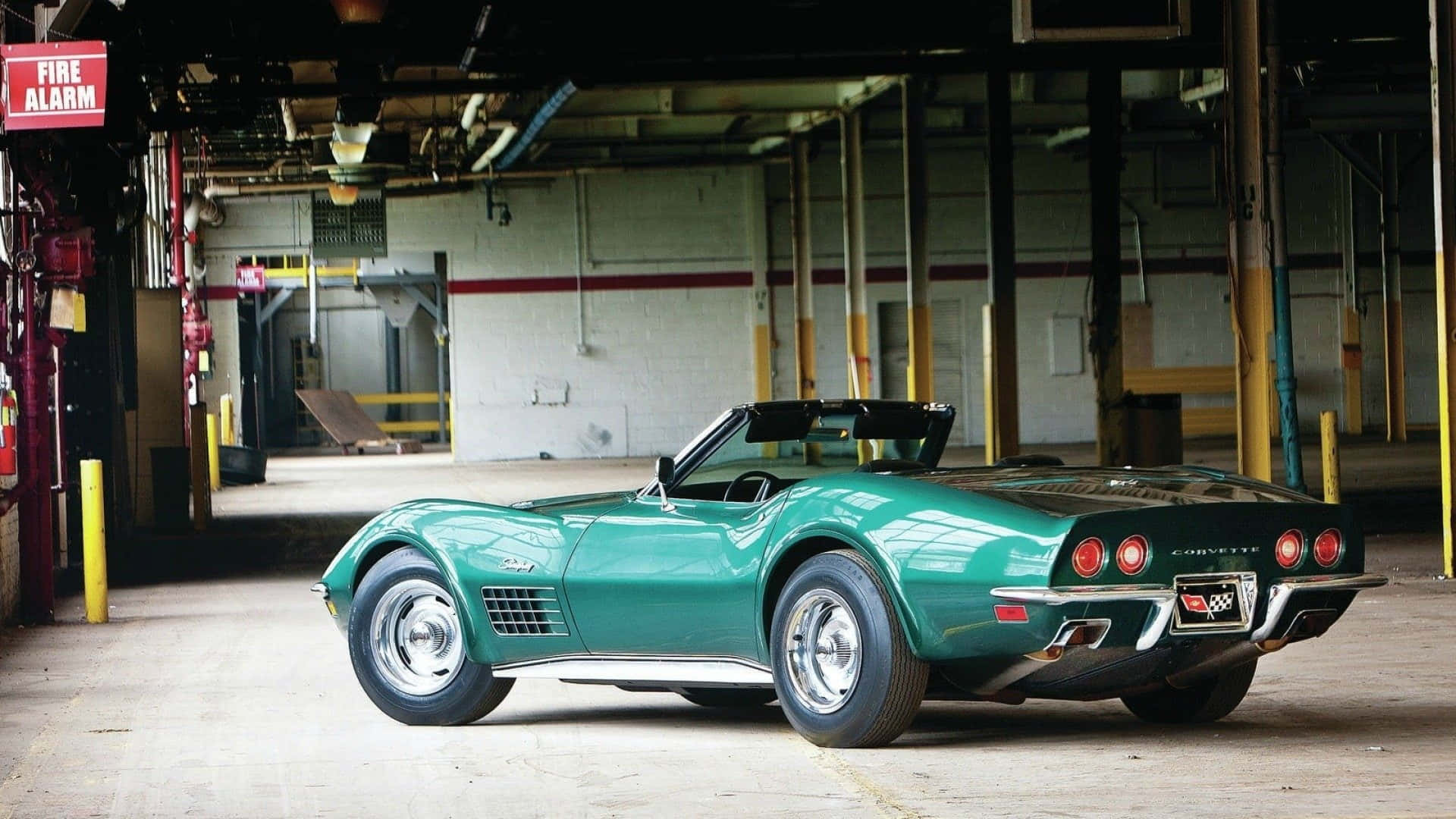 Caption: Classic Chevrolet Corvette C3 In Radiant Sunset Wallpaper