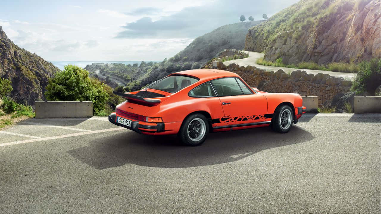 Caption: "classic Elegance Meets Modern Style - A Stunning Porsche 912 On An Open Road." Wallpaper