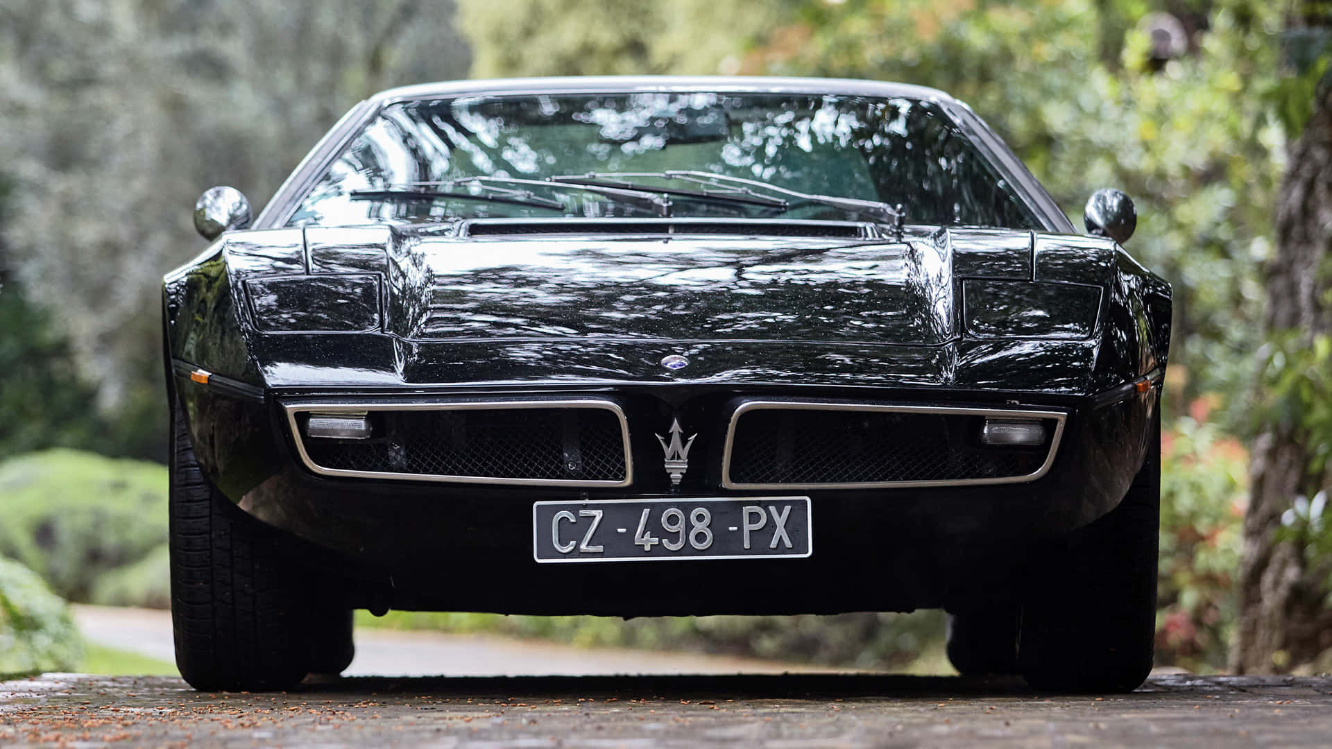 Caption: Classic Maserati Bora - Icon Of Italian Luxury And Speed Wallpaper