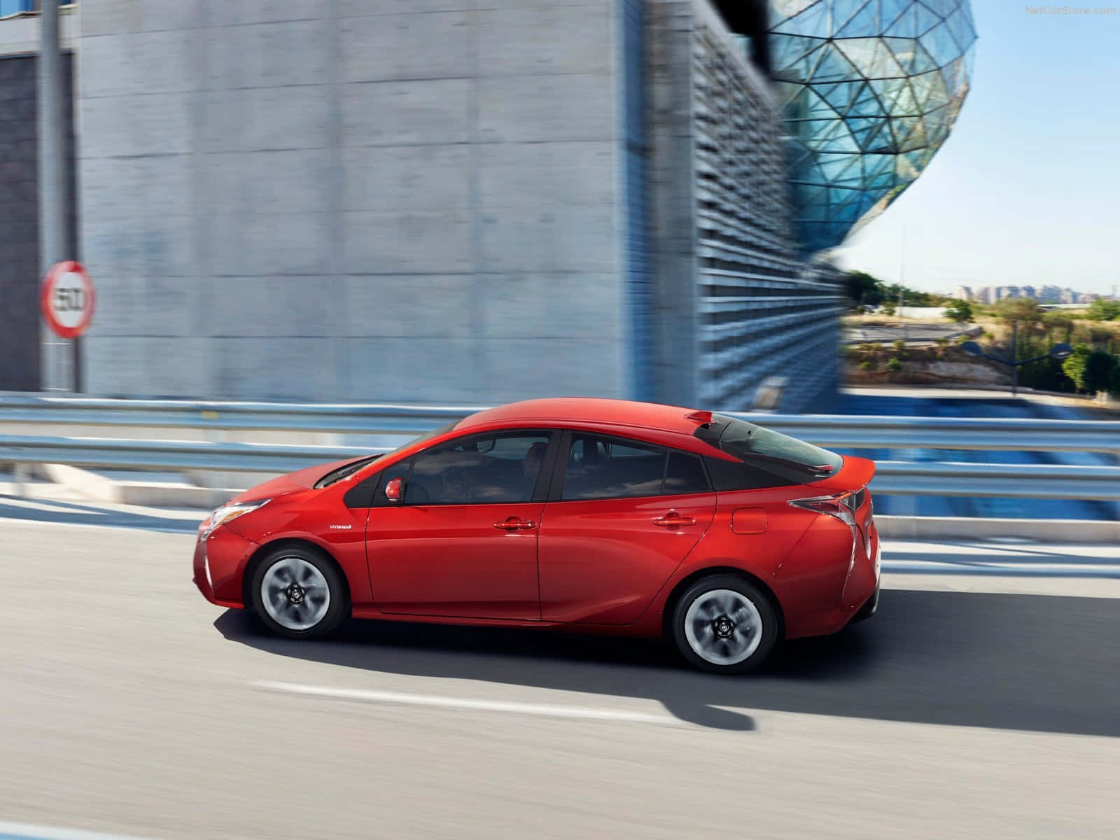 Caption: Clean And Sleek 2020 Toyota Prius On A High-tech Highway Wallpaper