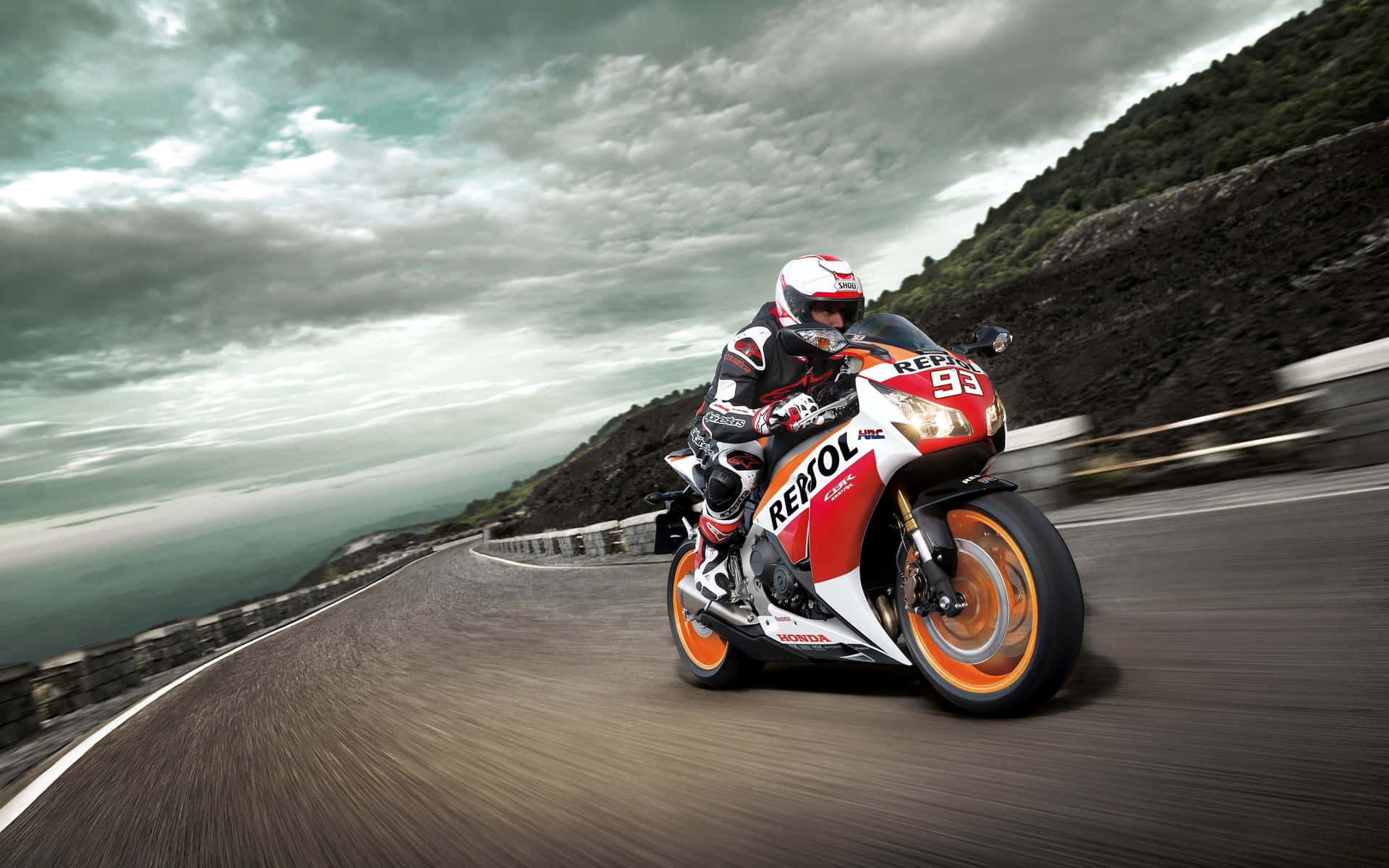 Caption: Conquering The Road With Honda Motorcycle Wallpaper