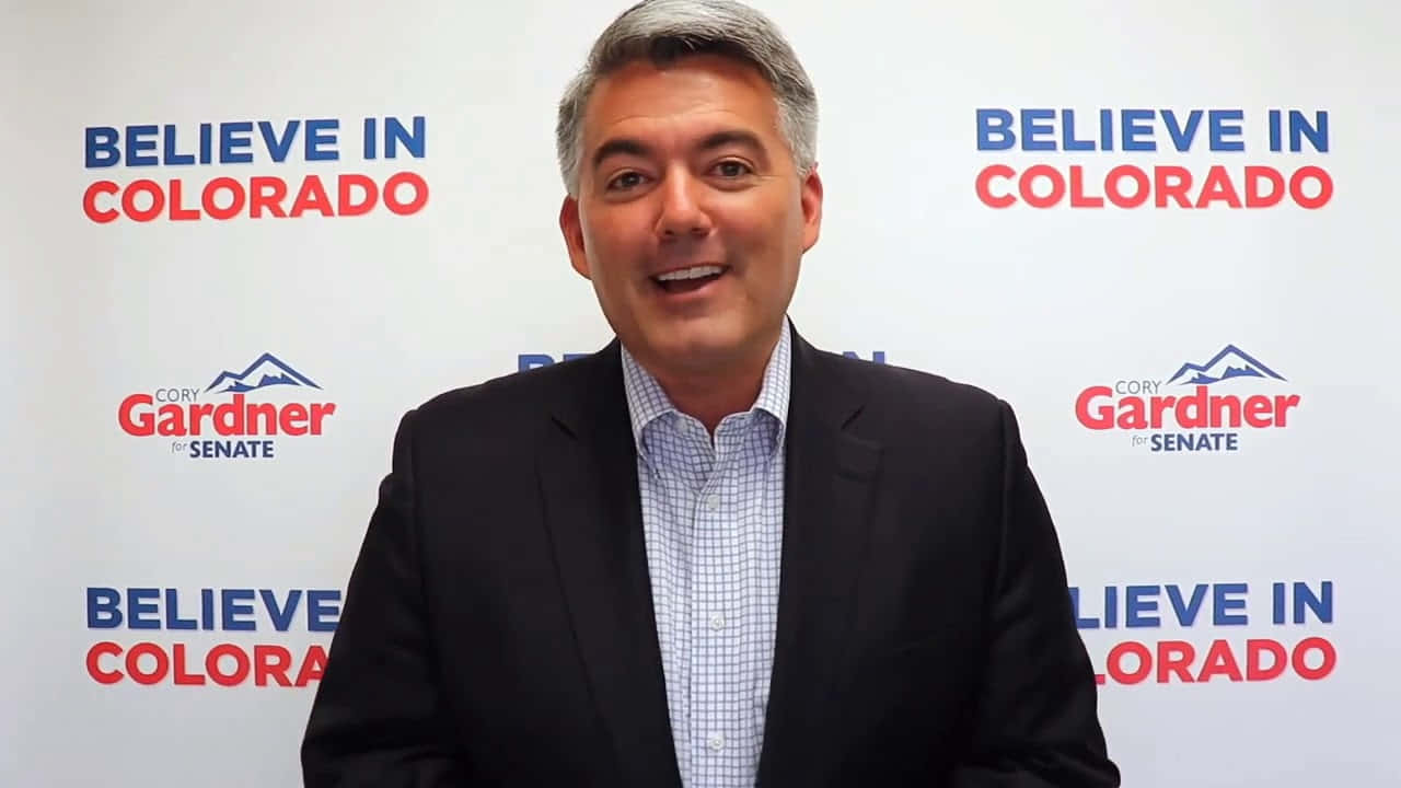 Caption: Cory Gardner At A Public Speaking Event Wallpaper