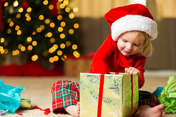 Caption: Dazzling Christmas Gift Box Wallpaper