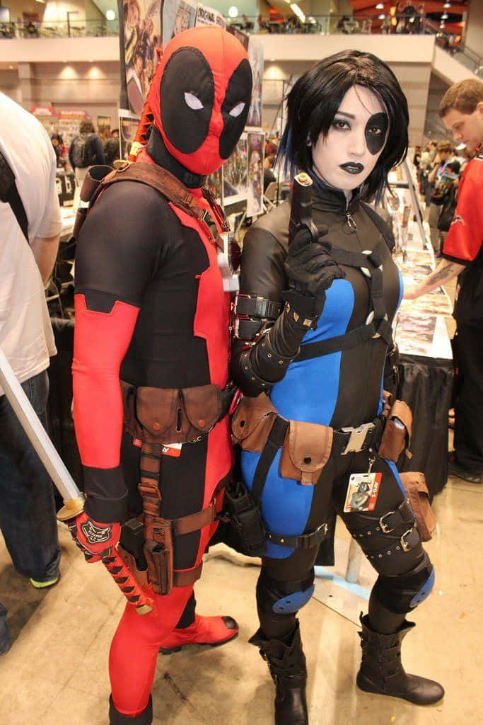 Caption: Deadpool And Domino: Lethal Duo Wallpaper
