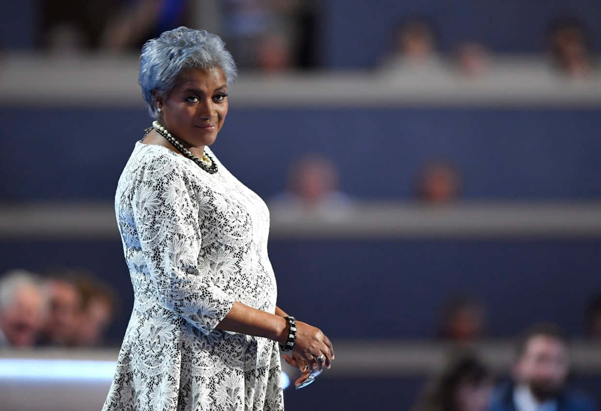 Caption: Donna Brazile Delivering A Thoughtful Speech Wallpaper