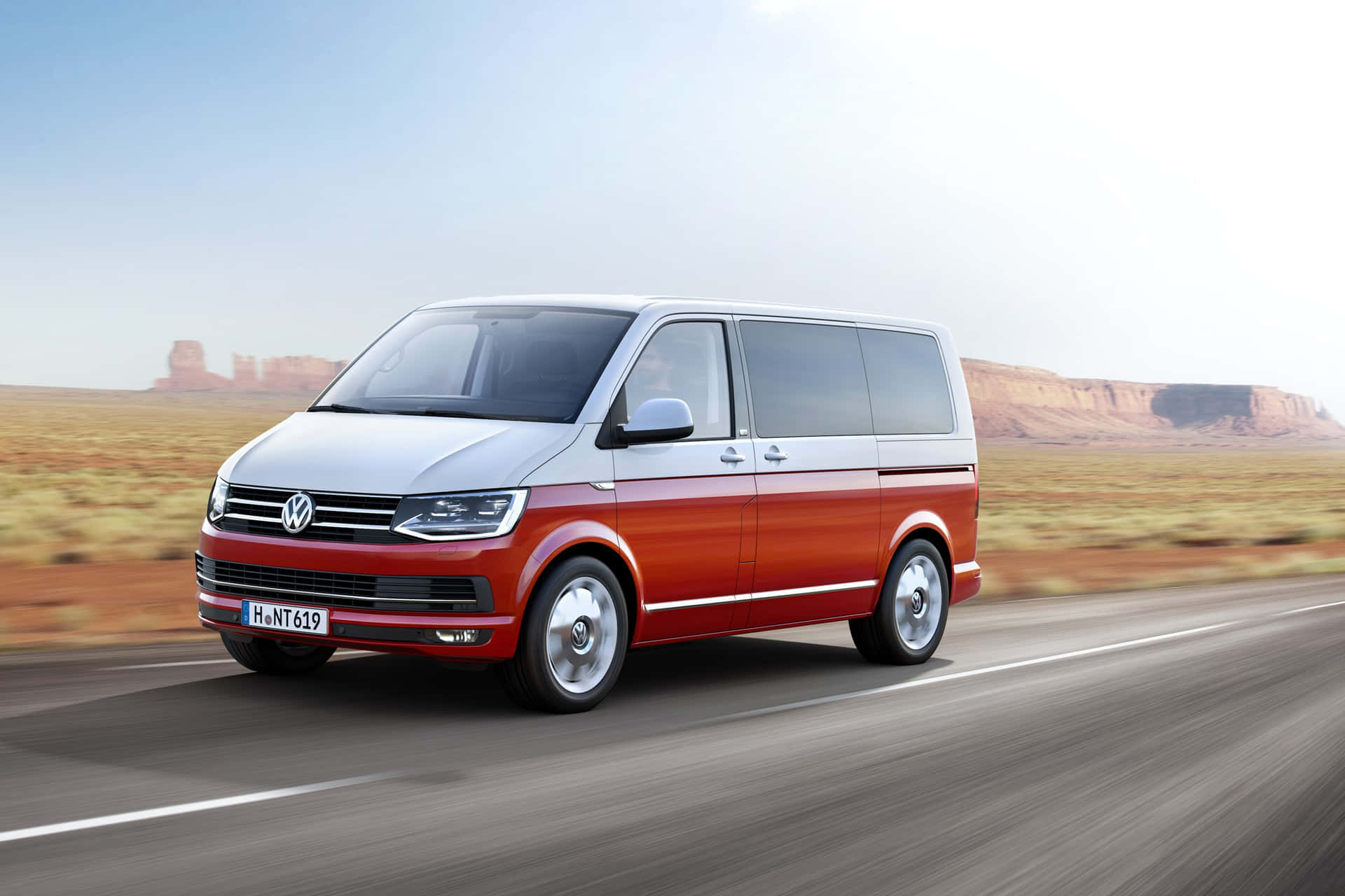 Caption: Dynamic Volkswagen Transporter In Motion Wallpaper