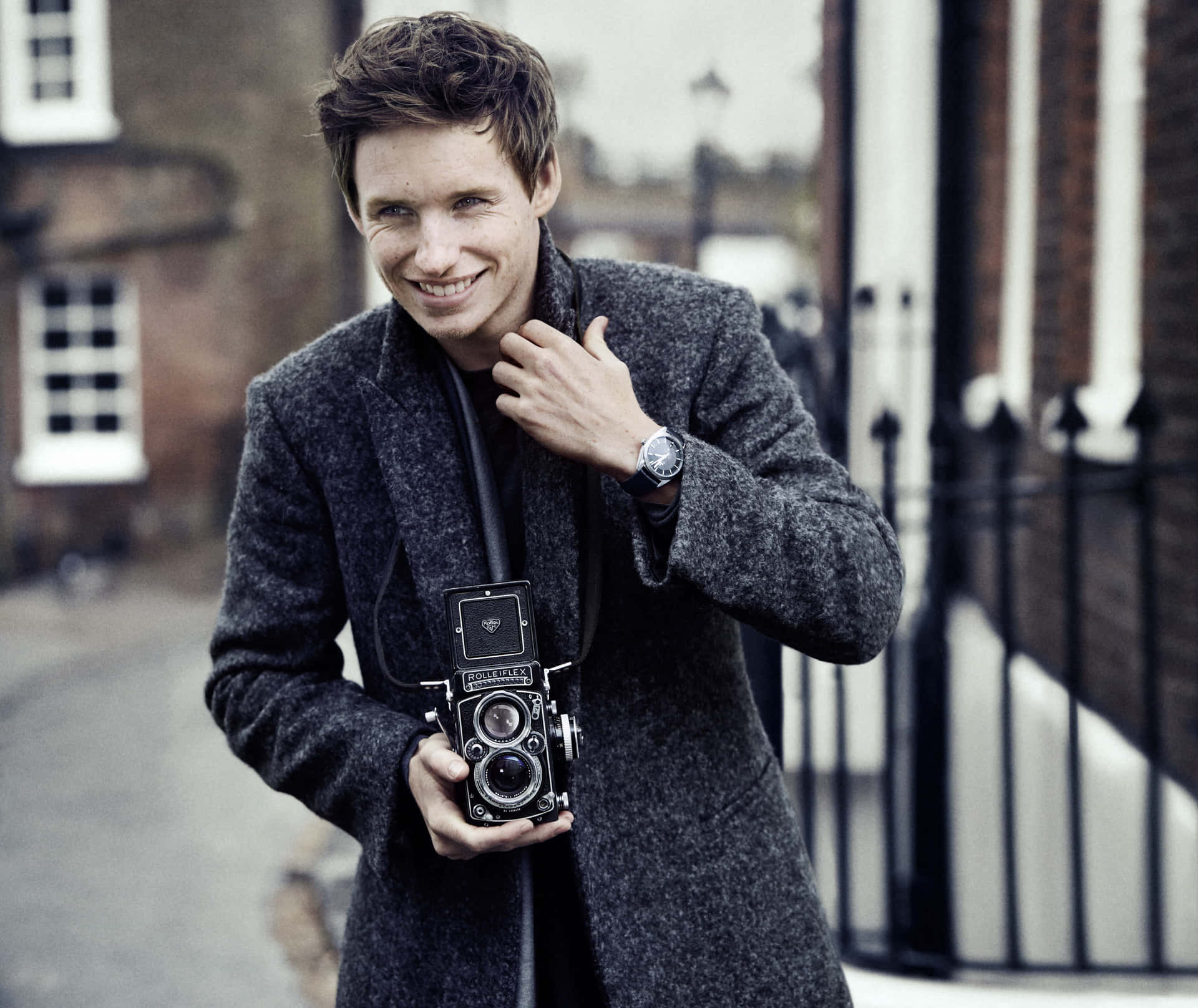 Caption: Eddie Redmayne Displaying His Charismatic Charm In A Casual Ensemble Wallpaper
