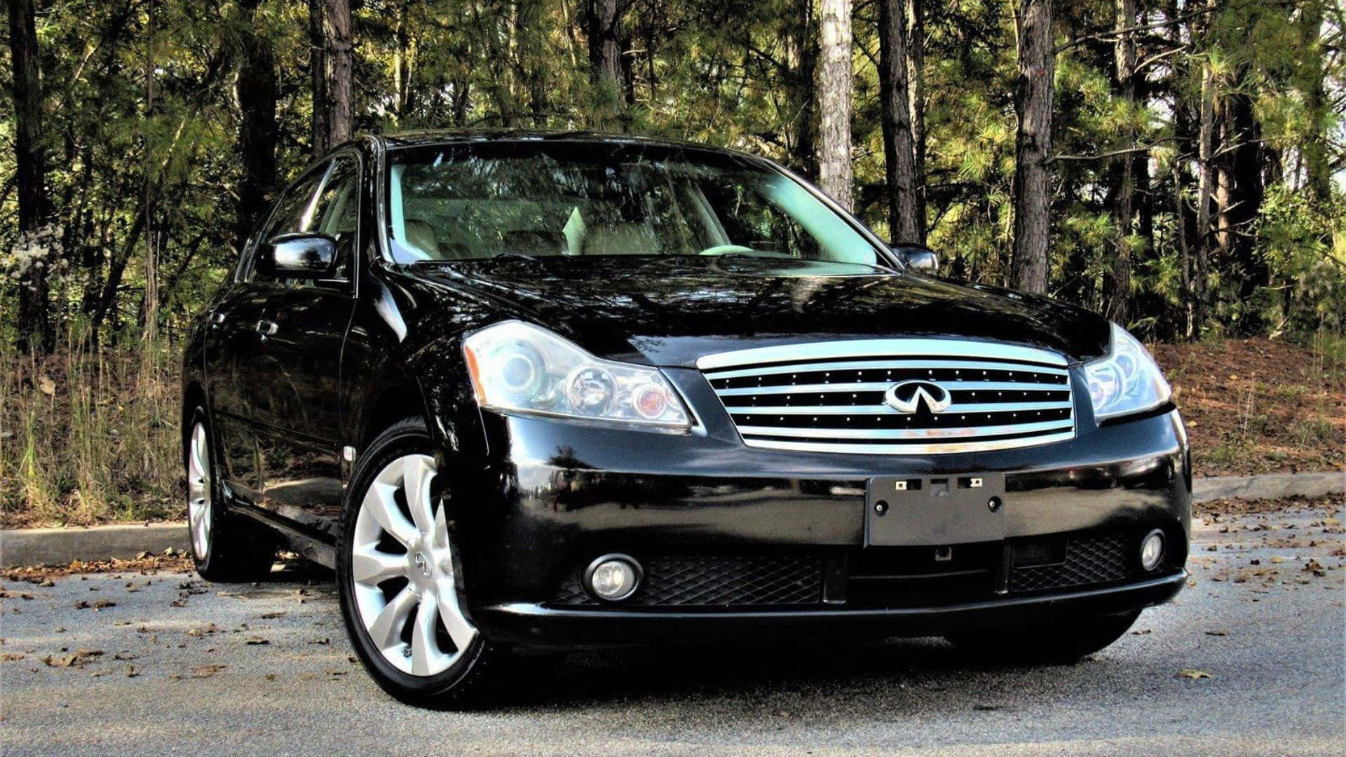 Caption: Elegance In Motion: Infiniti M35 On The Road Wallpaper