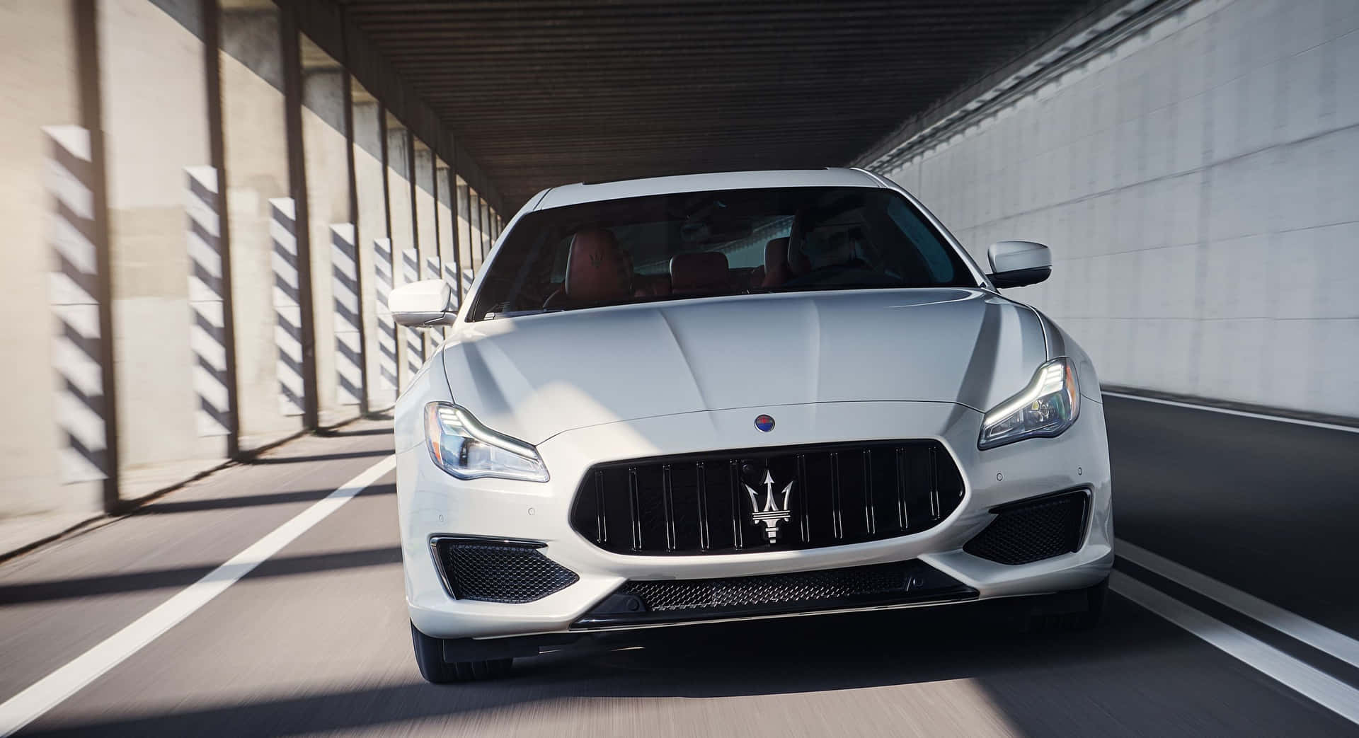 Caption: Elegance In Motion - Maserati Quattroporte Wallpaper