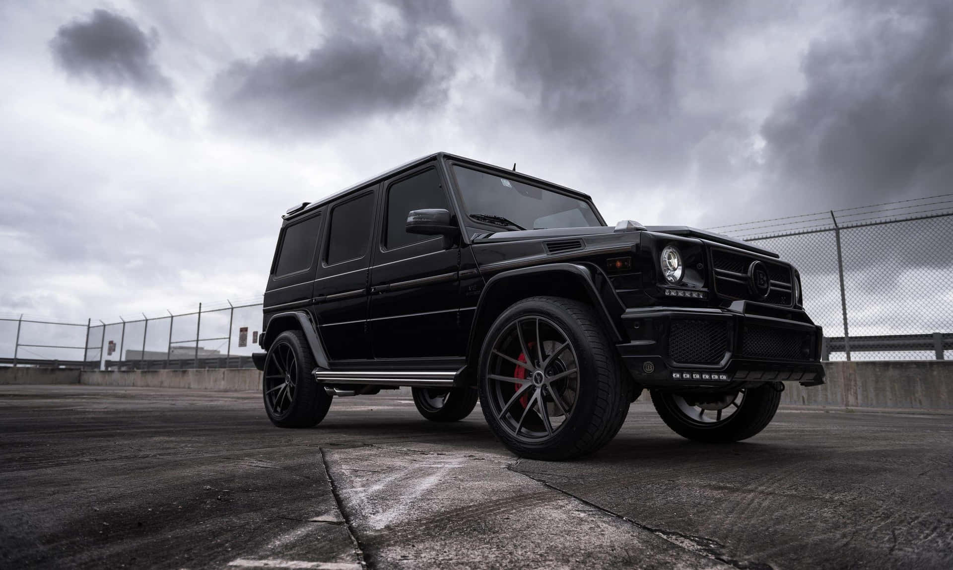 Caption: Elite Mercedes Benz G-class Unleashing Power On Open Road Wallpaper