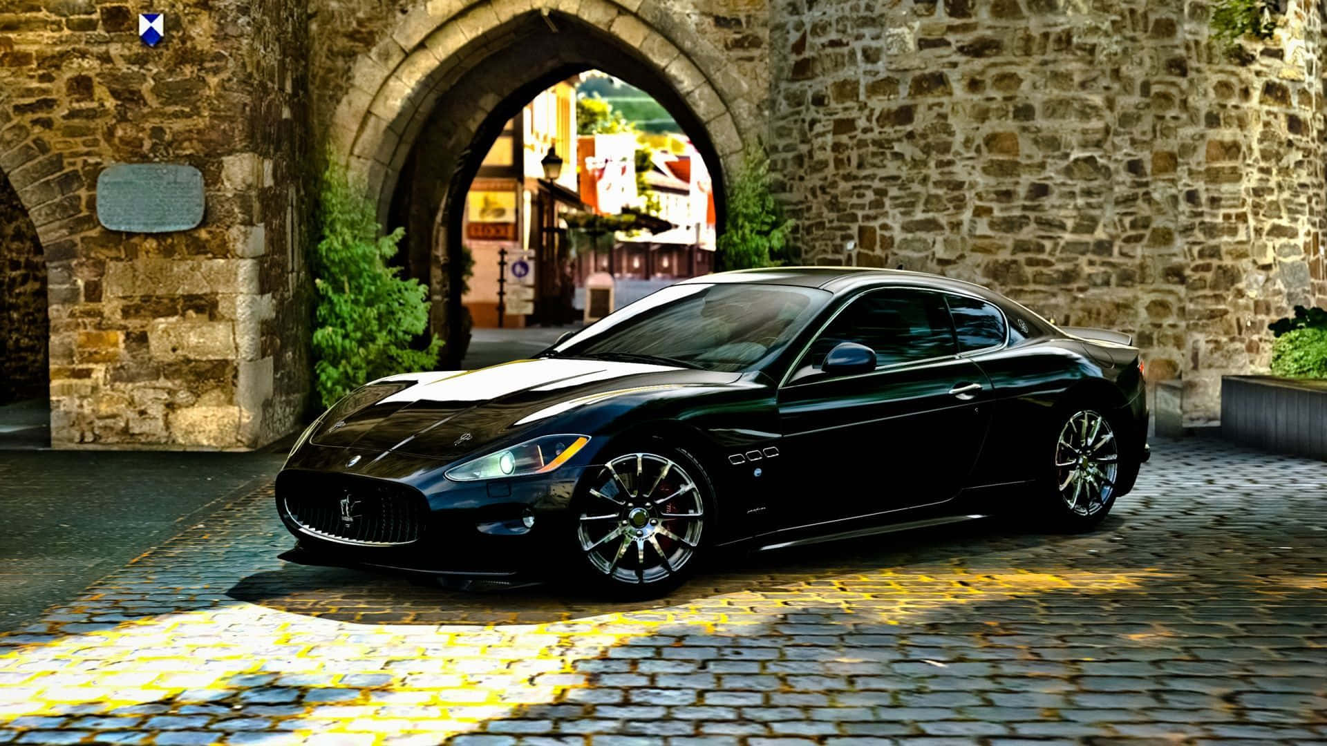Caption: Enthralling Elegance - A Maserati Granturismo In Its Pristine Glory Wallpaper