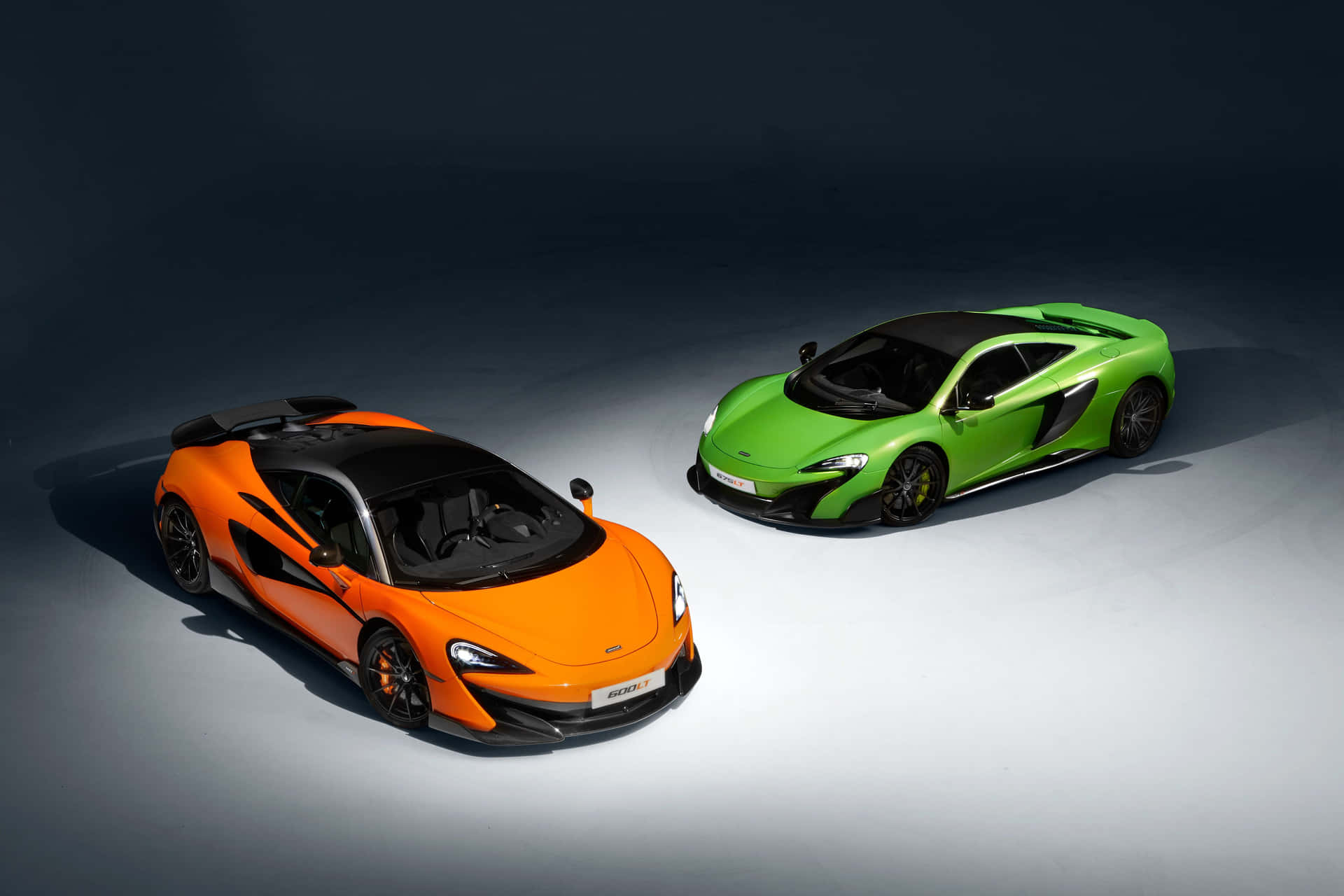 Caption: Experience Speed And Luxury With The Mclaren 675lt Wallpaper