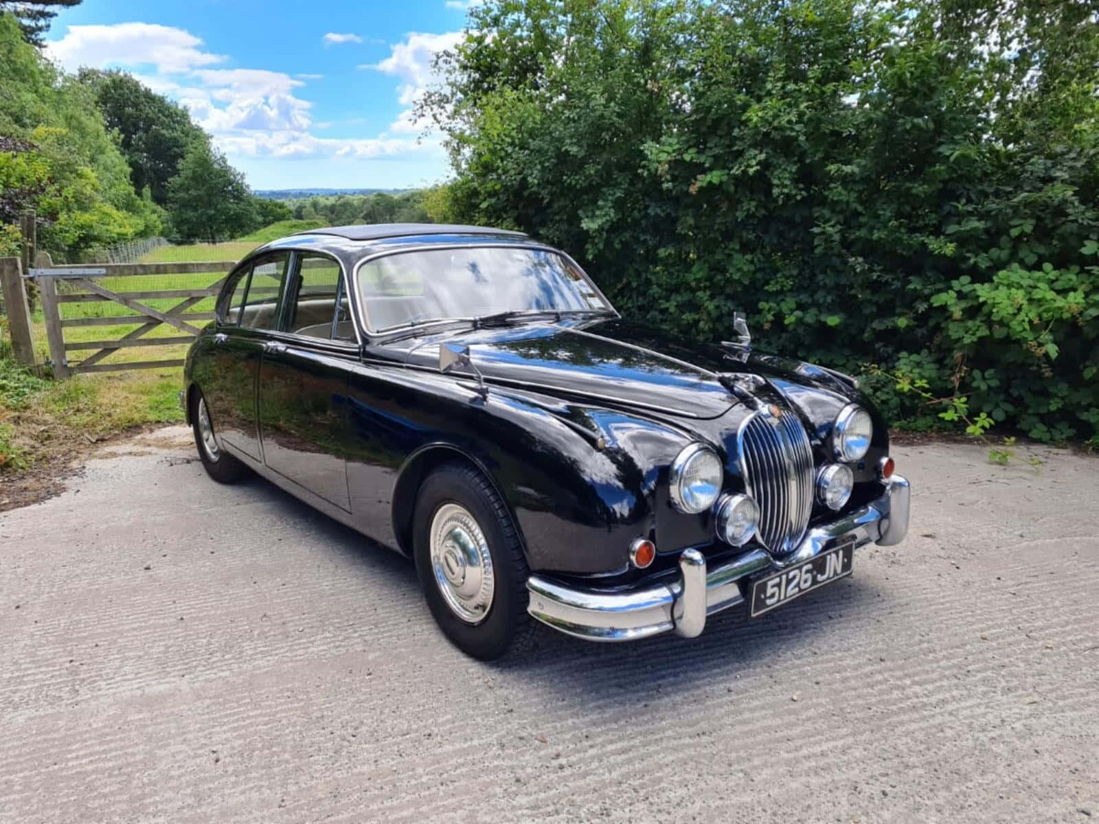 Caption: Flawless Blend Of Heritage And Elegance: Majestic Jaguar Mark 2 Wallpaper