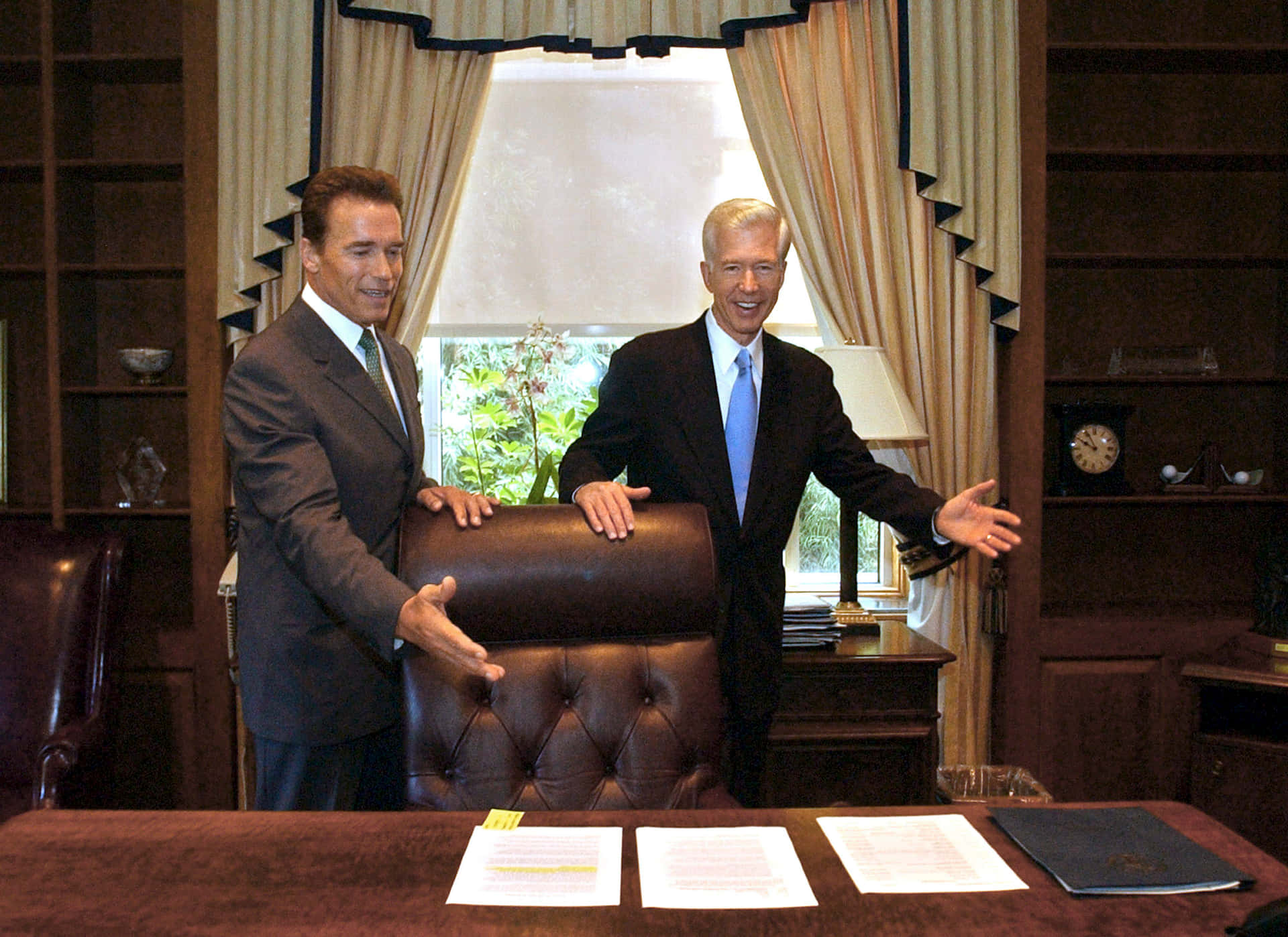 Caption: Former California Governor Gray Davis With Arnold Schwarzenegger Wallpaper