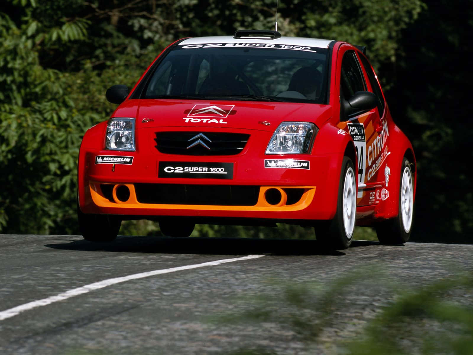 Caption: High-speed Action With Citroen C2 Super 1600 Wallpaper