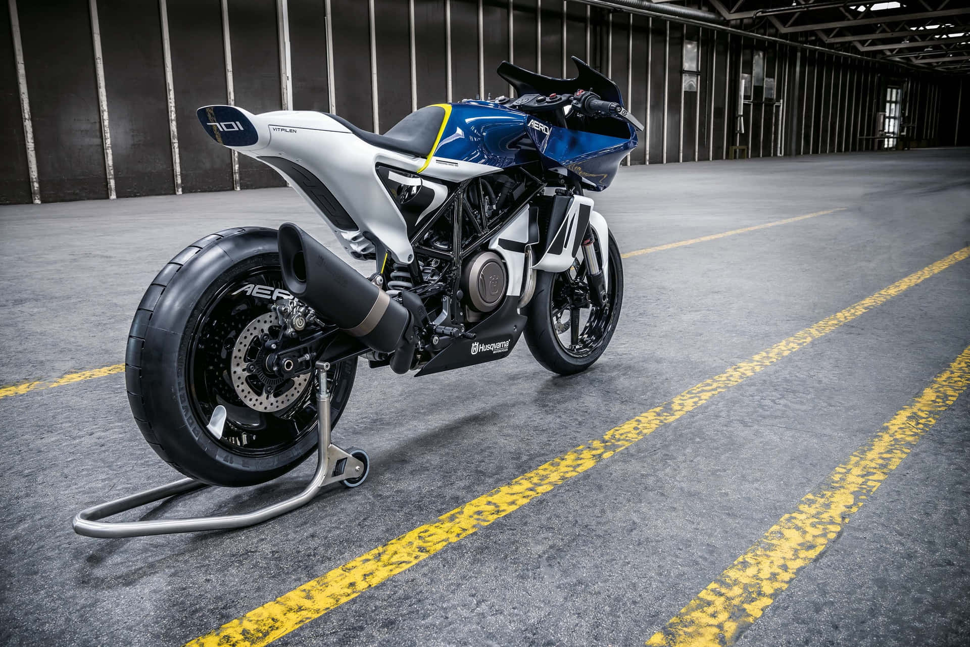 Caption: Husqvarna Motorcycle Powered For Speed Wallpaper