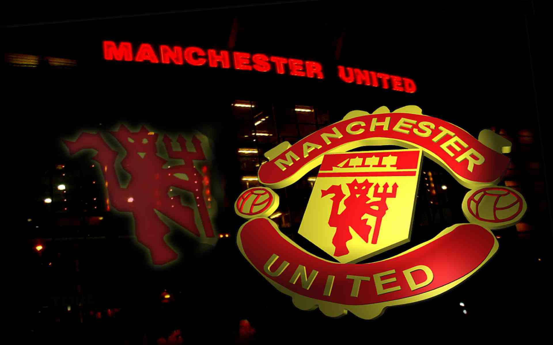 Caption: Iconic Manchester United Logo Wallpaper