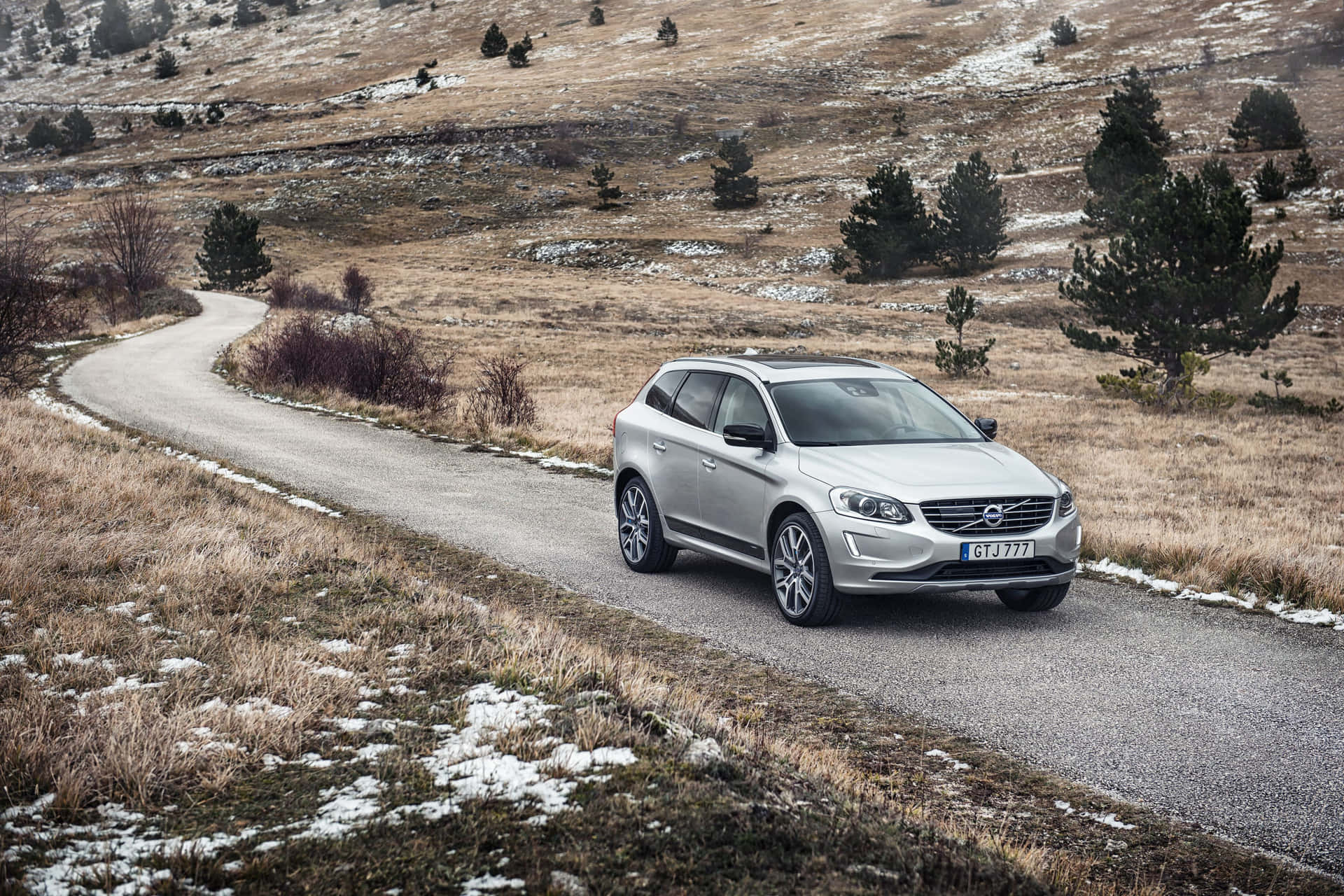 Caption: Immaculate Volvo Xc60 On An Exhilarating Road Trip Wallpaper