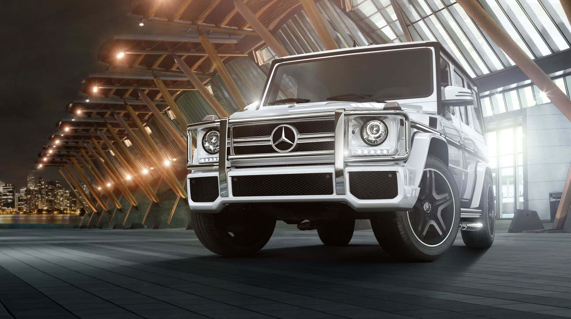 Caption: Impeccable Opulence Meets Rugged Reaffirmation: The Mercedes Benz G Class Wallpaper