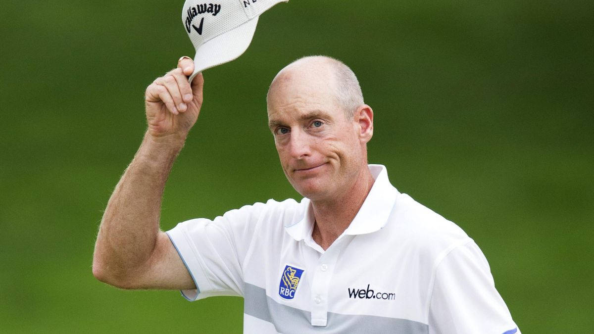 Caption: Jim Furyk Concentrating On His Golf Swing. Wallpaper