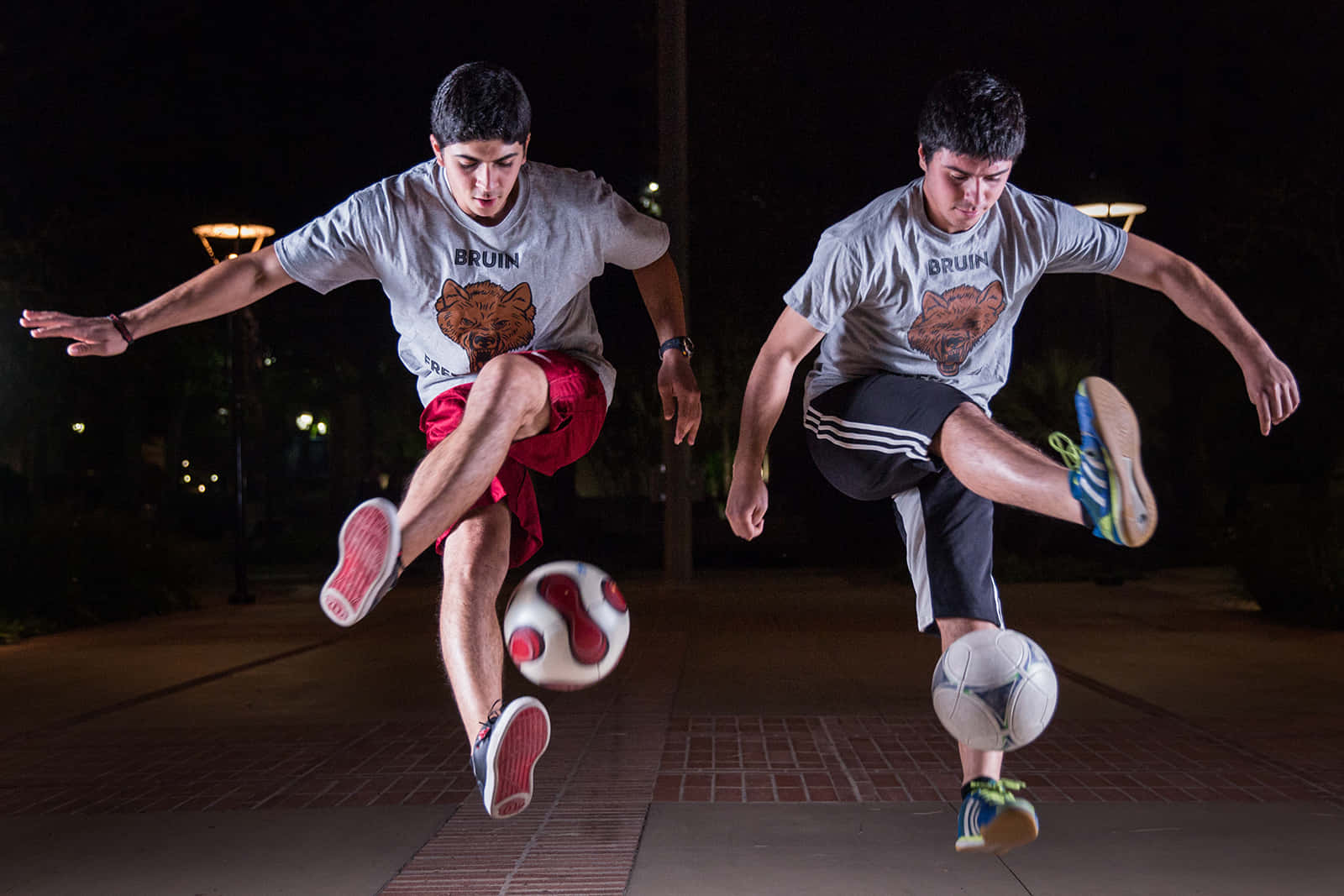 Caption: Kinetic Artistry - Freeze Frame Of A Freestyle Soccer Prodigy Wallpaper