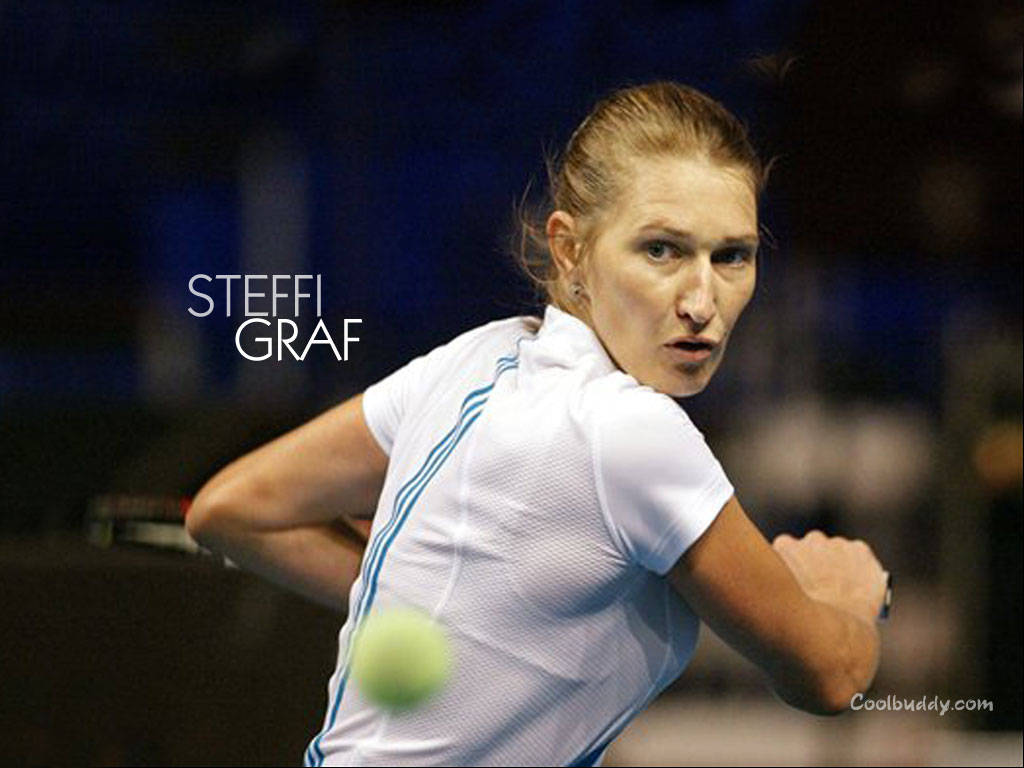 Caption: Legendary Tennis Player Steffi Graf In Action Wallpaper