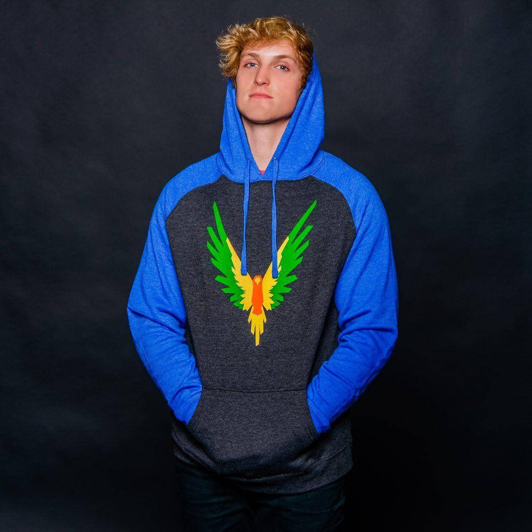 Caption: Logan Paul, A Significant Online Influencer, In A Candid Shot. Wallpaper