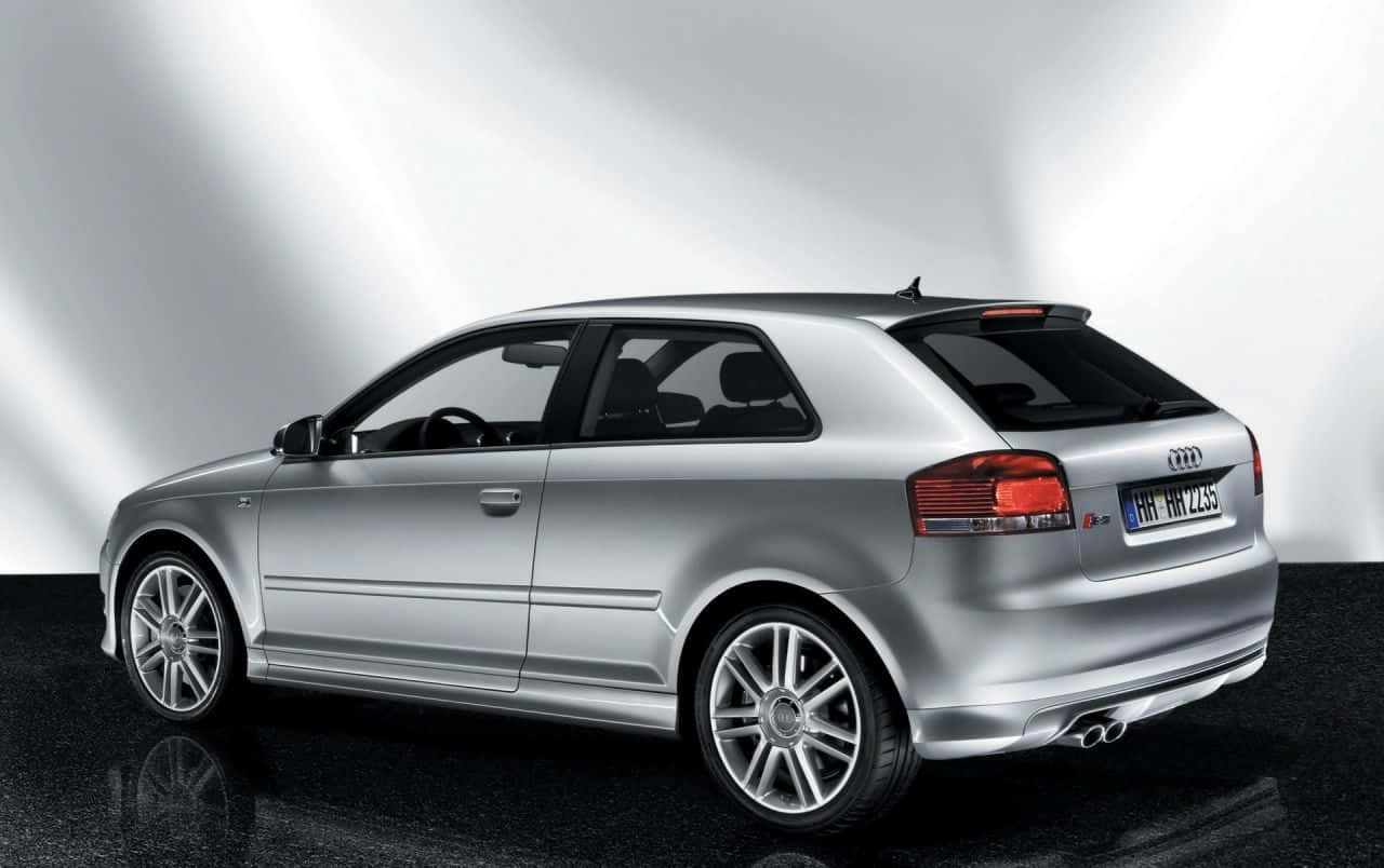 Caption: Luxurious Audi S3 In A Stunning Landscape Wallpaper