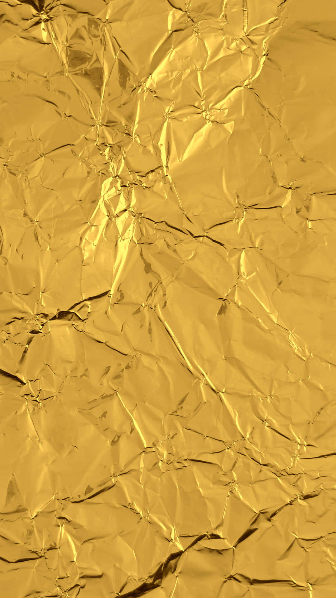 Caption: Luxurious Gold Foil Texture Background