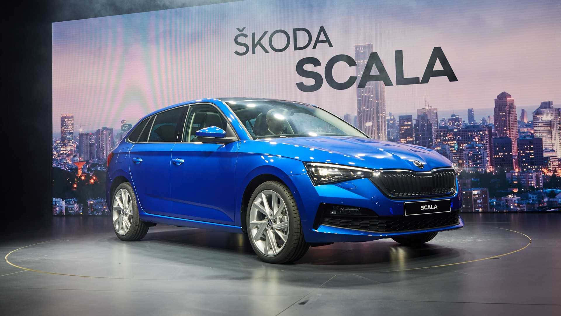 Caption: Luxurious Skoda Scala On Road Wallpaper