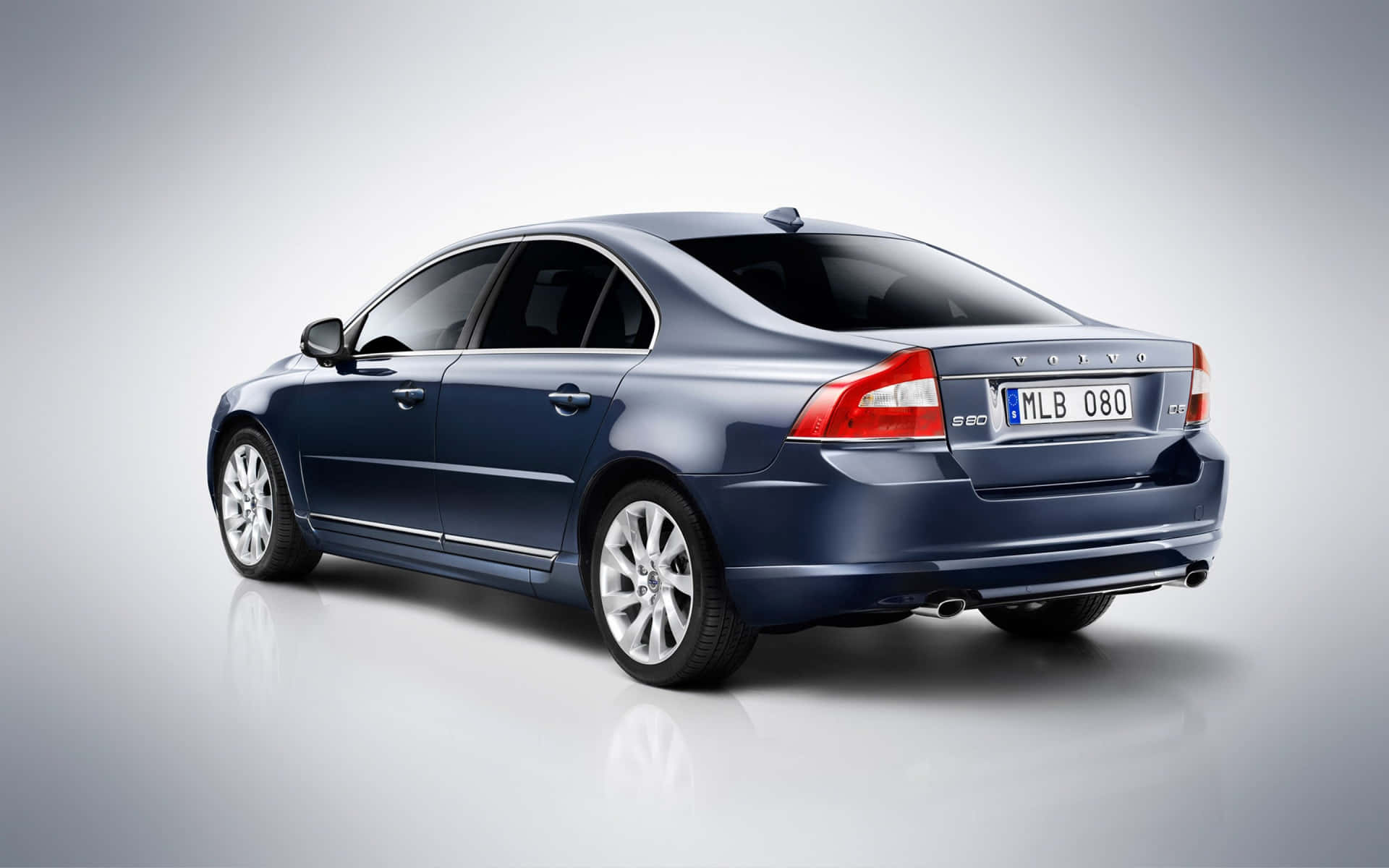 Caption: Luxurious Volvo S80 Car In Nighttime Scenery Wallpaper