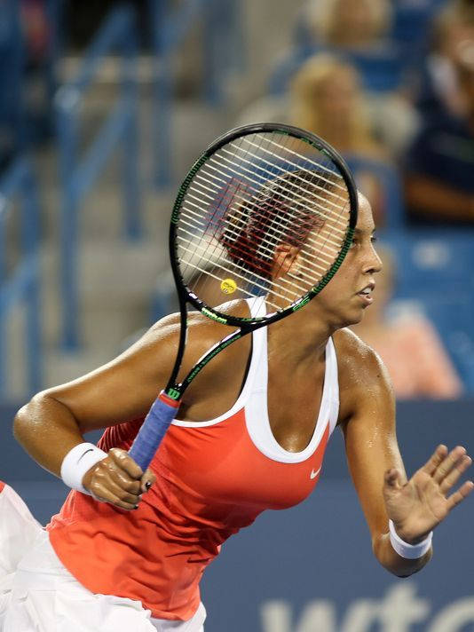 Caption: Madison Keys In Action On The Tennis Court Wallpaper