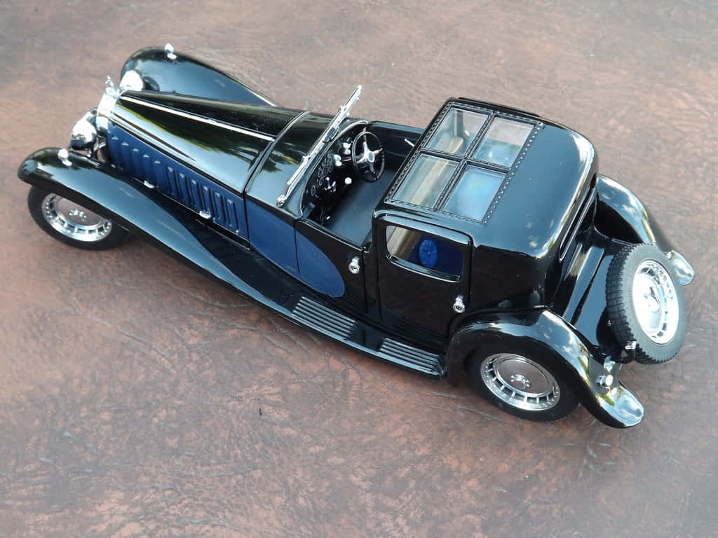 Bildetekst: Majestetiske Bugatti Type 41 Royale På Veien Bakgrunnsbildet