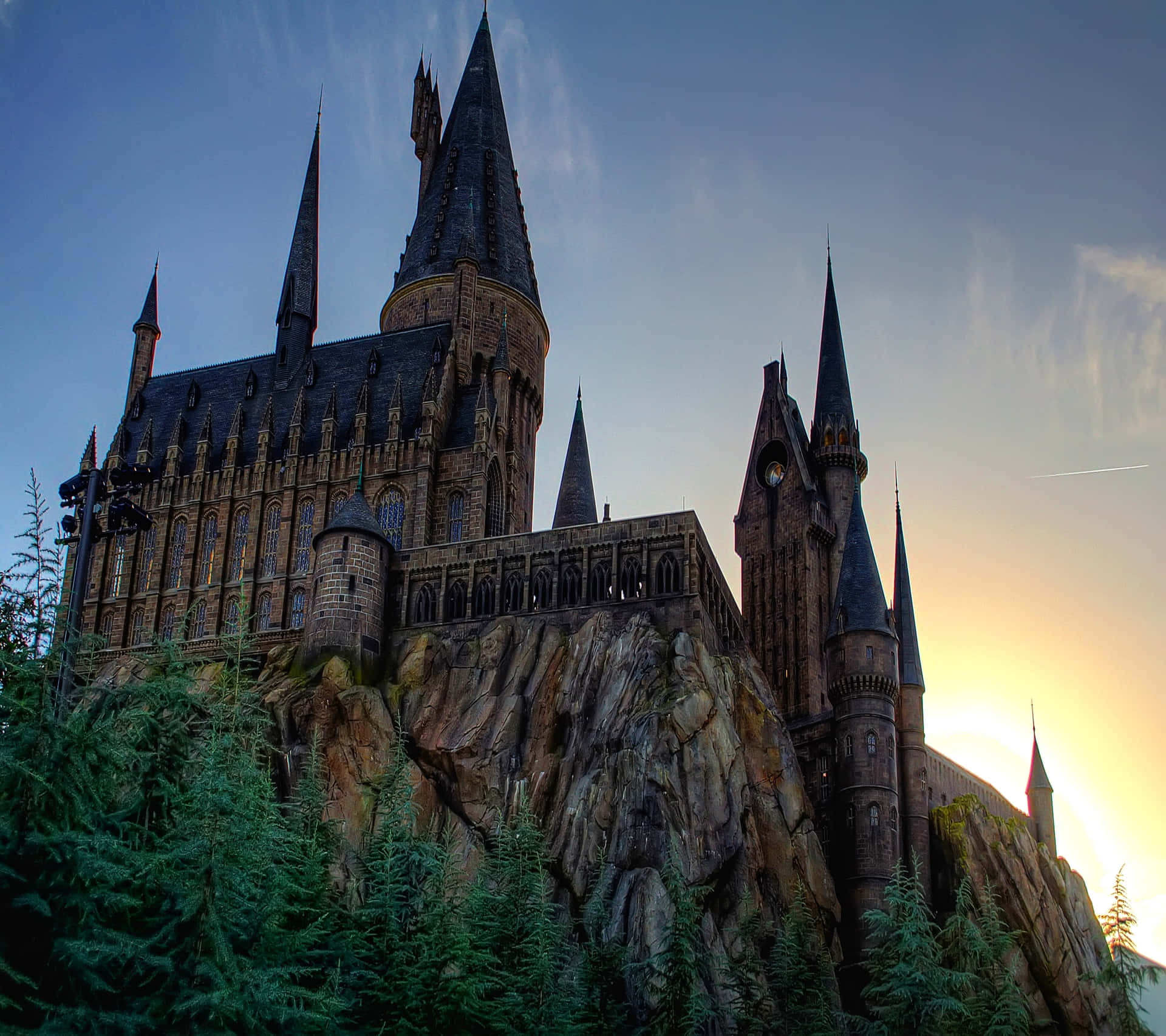 Caption: Majestic Hogwarts Castle Illuminated At Dusk