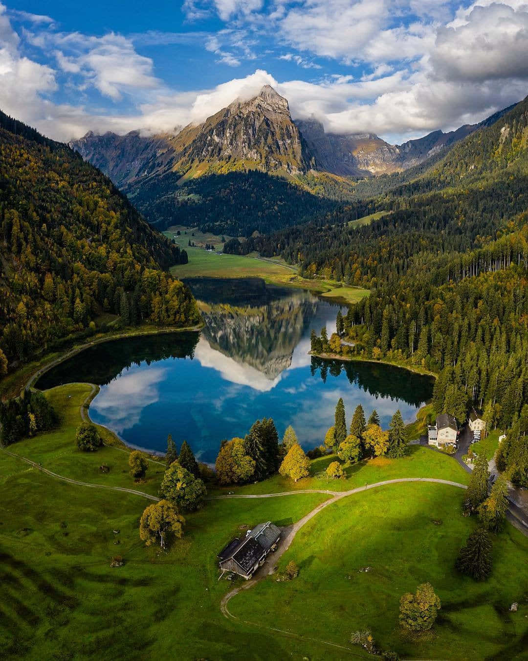 Caption: Majestic Landscape Of Glarus Valley Wallpaper