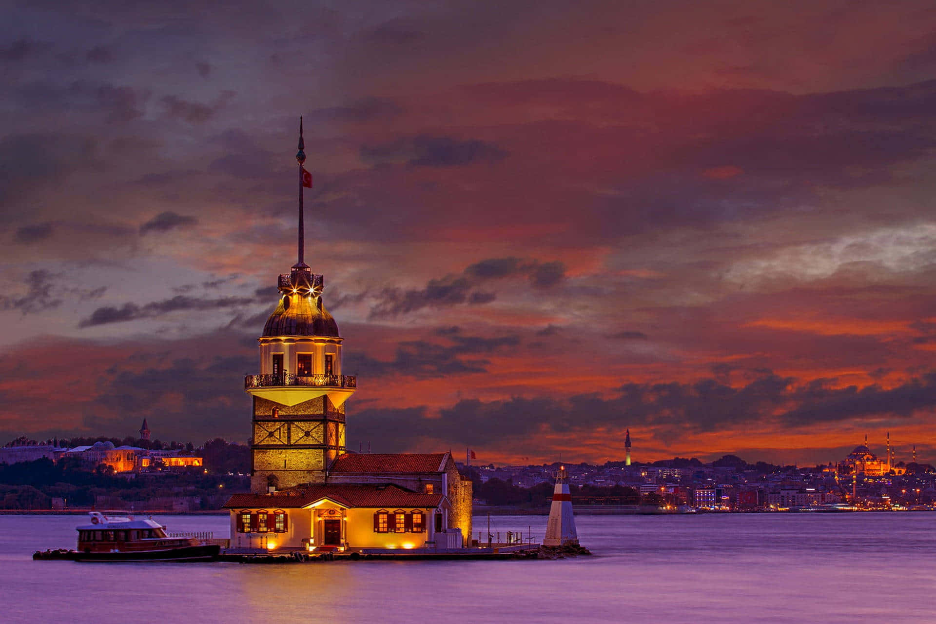 Caption: Majestic Maiden Tower At Sunset Wallpaper