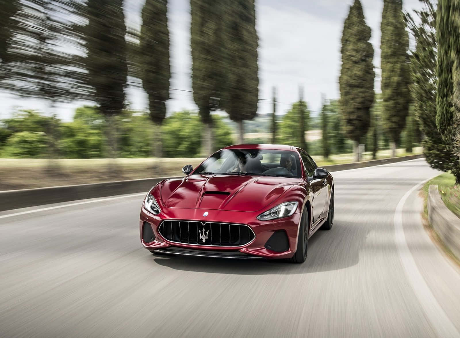 Caption: Majestic Maserati Granturismo: Ultimate Luxury And Performance Wallpaper