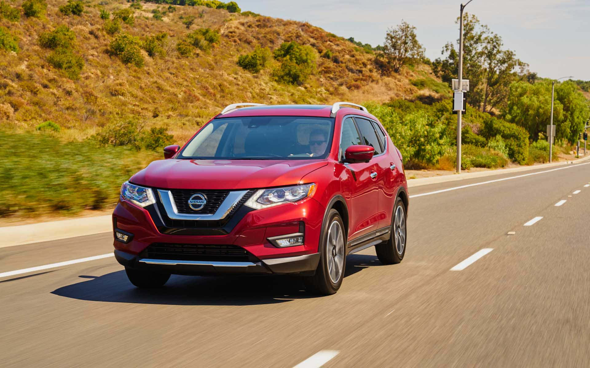 Caption: Majestic Nissan Rogue Out On An Adventure Wallpaper