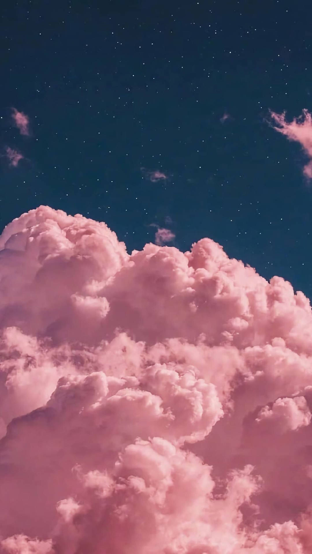 Caption: Majestic Pink Clouds At Dusk Wallpaper