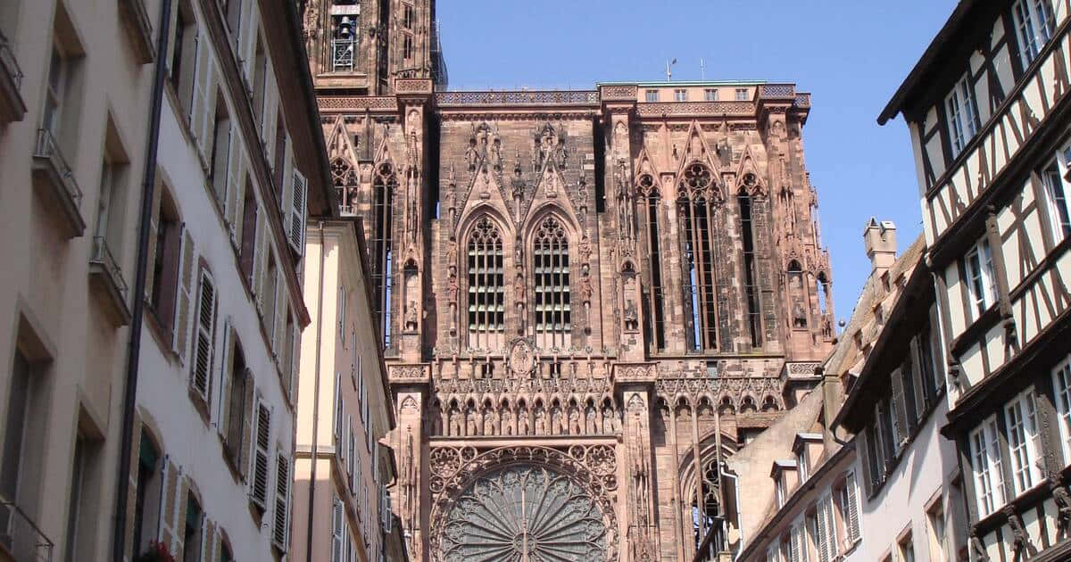 Caption: Majestic Strasbourg Cathedral Against A Beautiful Twilight Sky Wallpaper