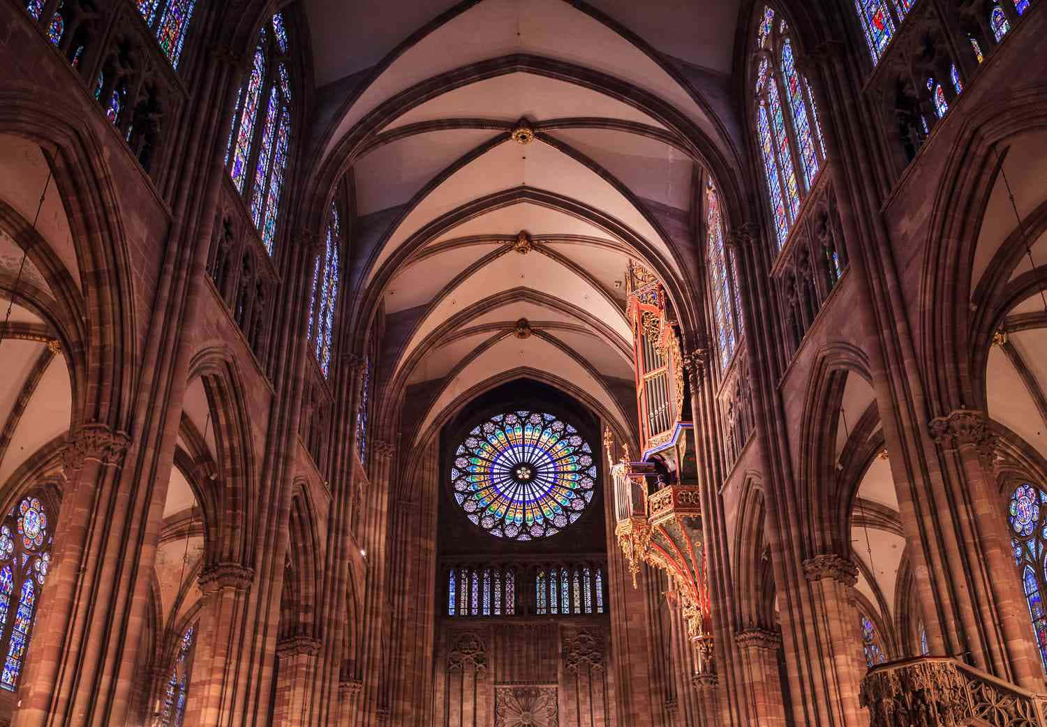 Caption: Majestic Strasbourg Cathedral In France At Dusk Wallpaper