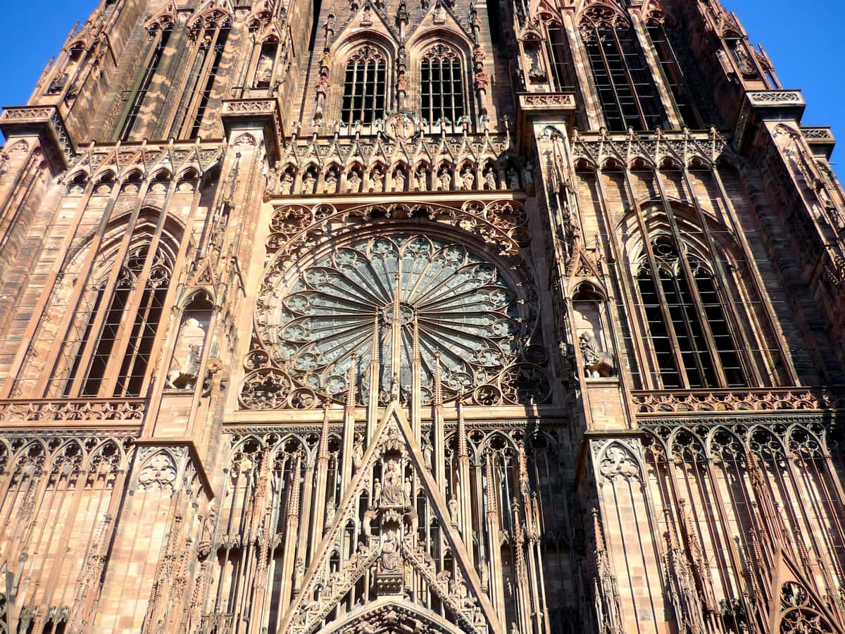 Caption: Majestic View Of Strasbourg Cathedral, France Wallpaper