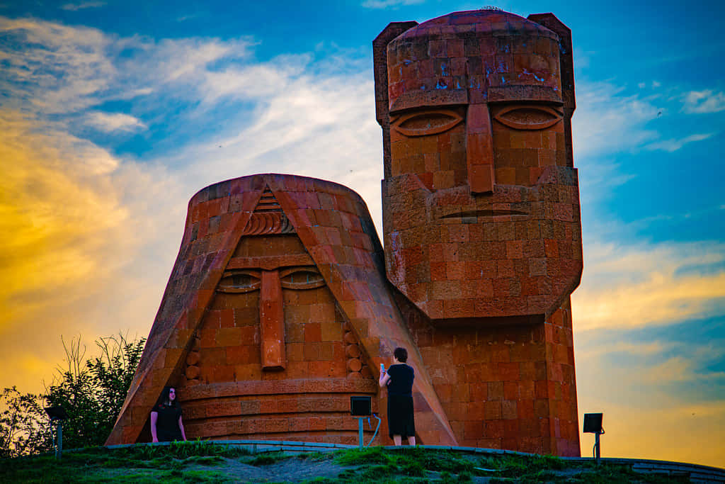 Caption: Majestic View Of We Are Our Mountains Sculpture In Artsakh Wallpaper