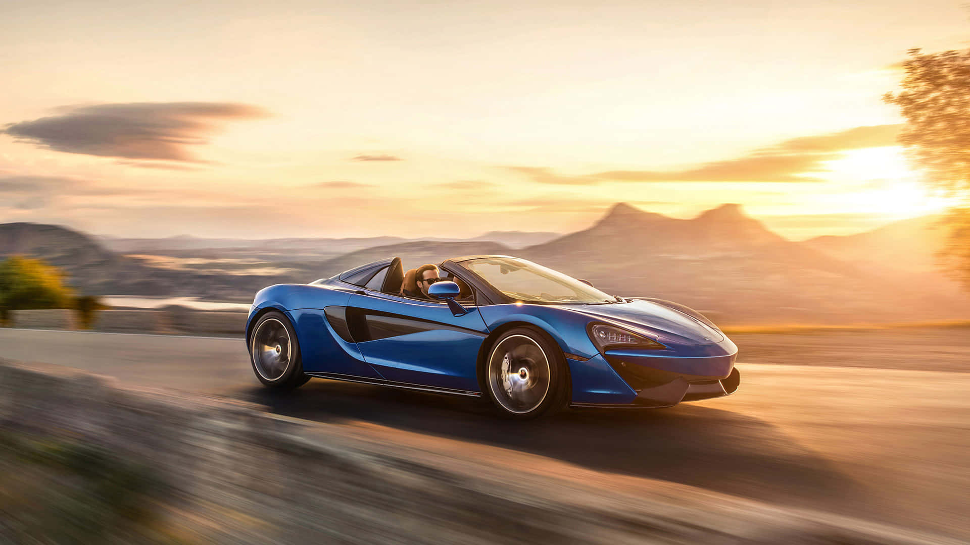 Caption: "mclaren 570s - A Fusion Of Luxury And Performance" Wallpaper