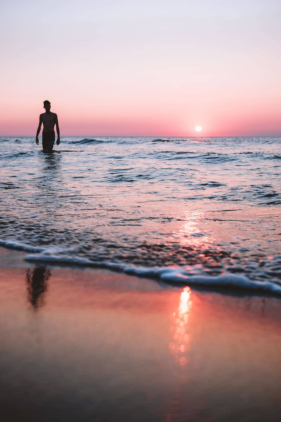 Caption: Mesmerizing Sunset At Sandy Beach Wallpaper