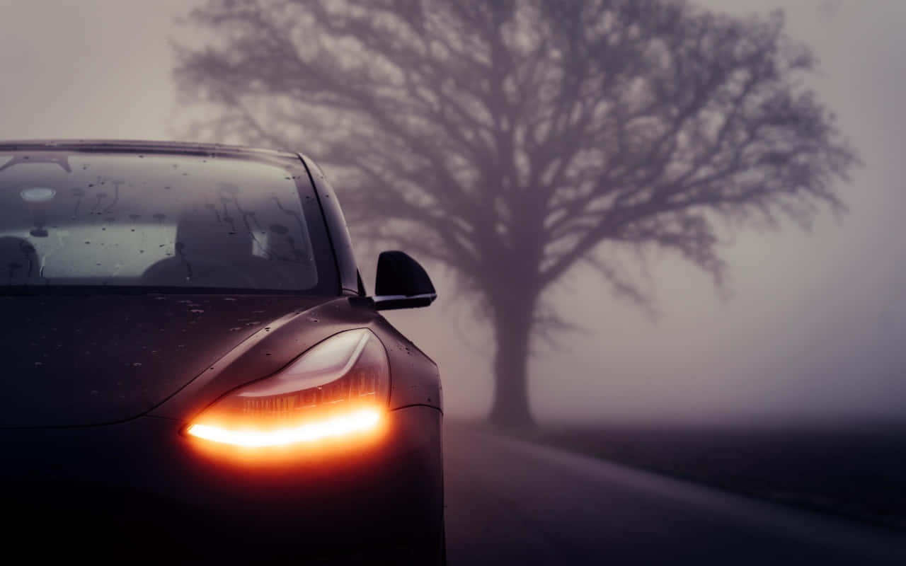 Caption: Modern Luxury - Tesla Model 3 Brisk Drive Wallpaper