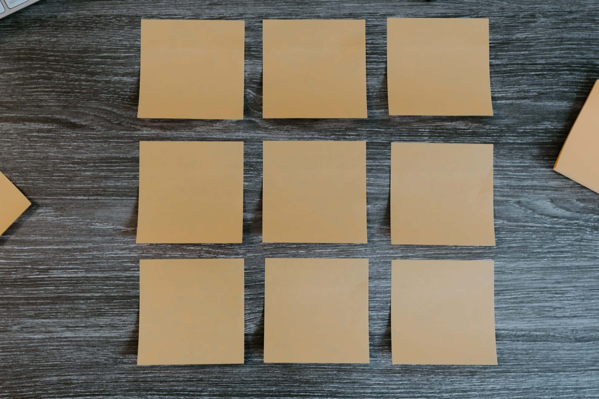 Caption: Neatly Arranged Sticky Notes On A Board Wallpaper