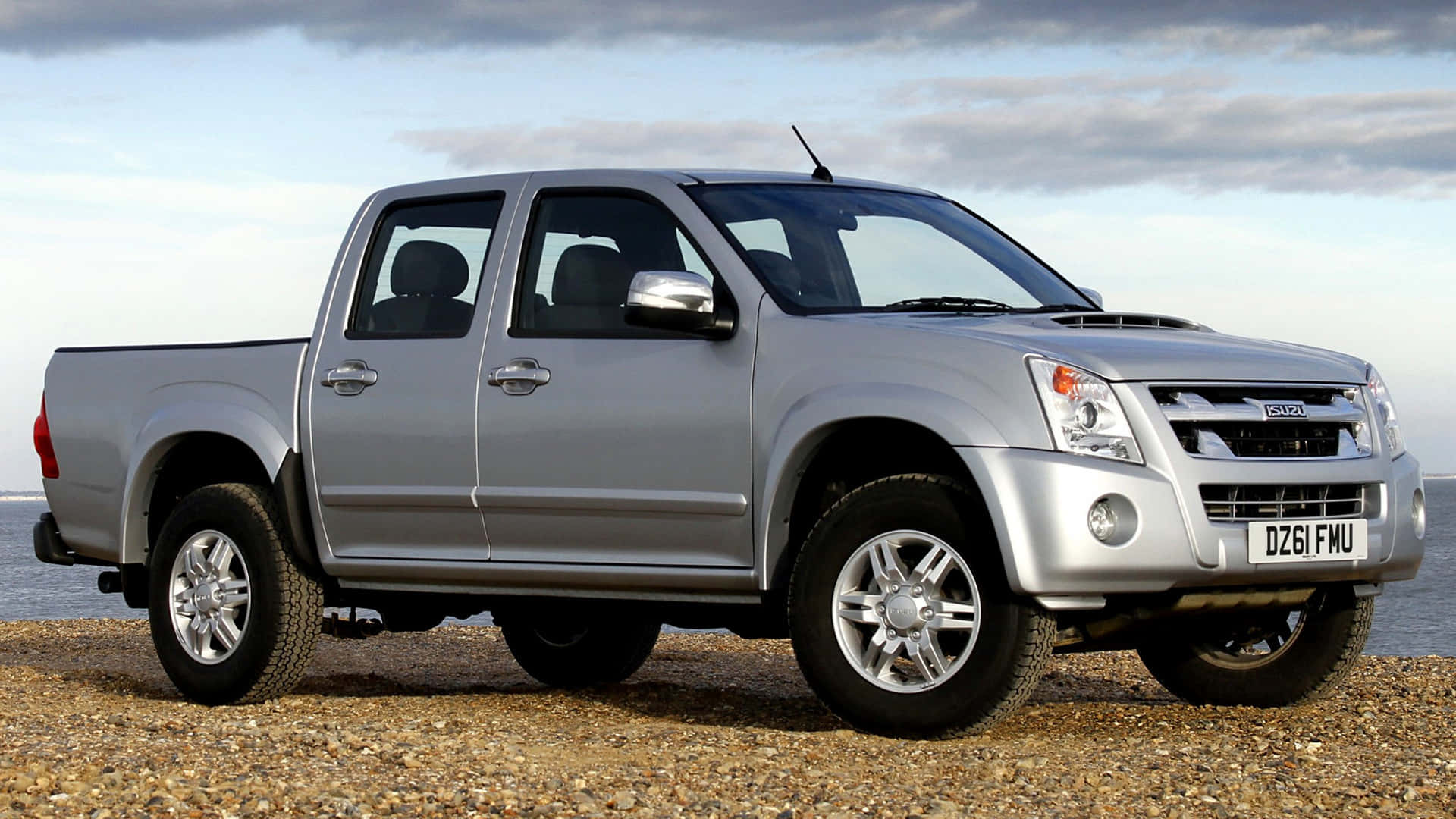 Caption: Powerful Isuzu Rodeo In Its Element Wallpaper